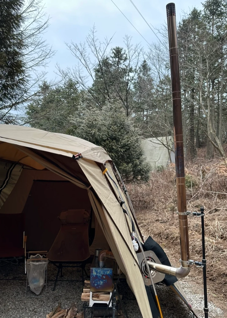 كيفية تركيب أنبوب مدخنة على موقد خيمة قماشية